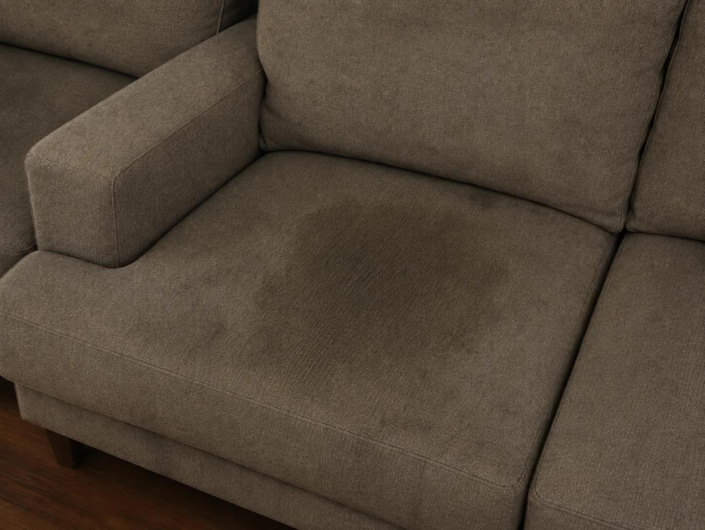 Sofa cushion with pet urine contamination before professional cleaning