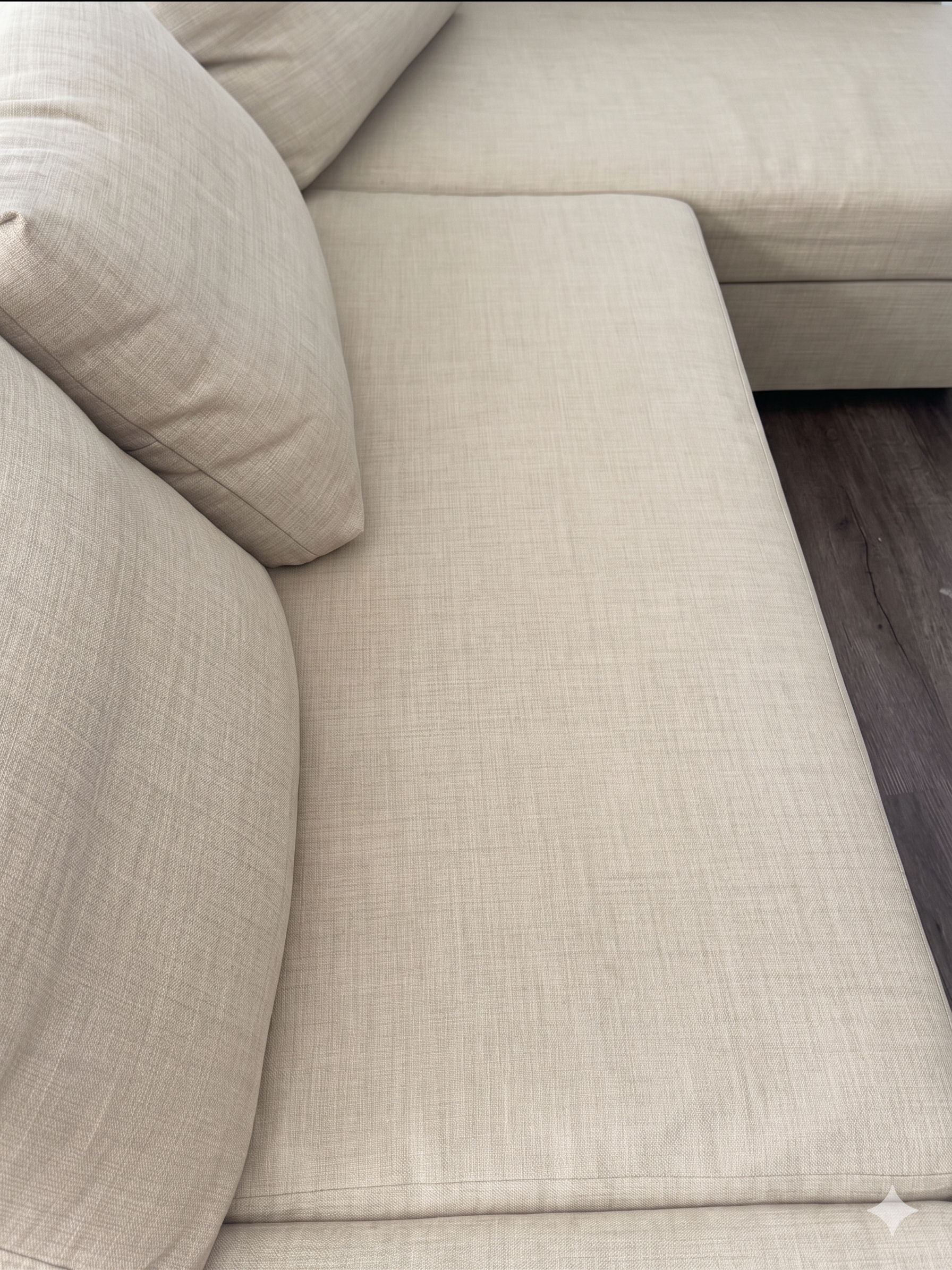 Sofa after cleaning showing improved appearance