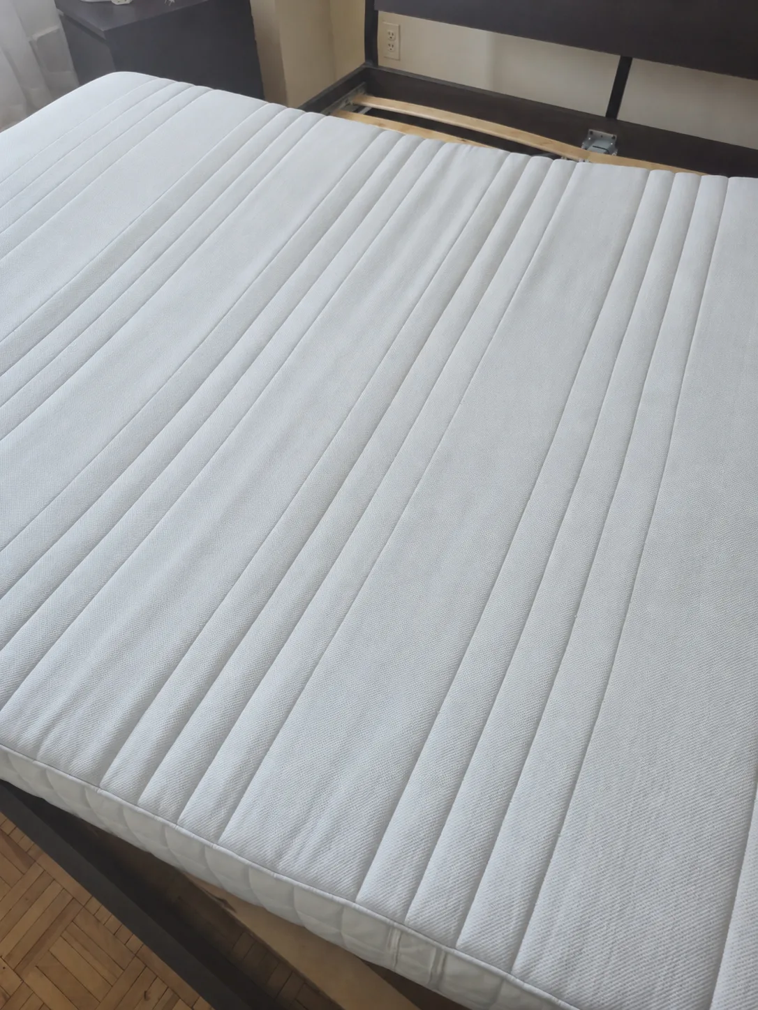 The same mattress after multi-stage cleaning, rinsing, neutralization, and assisted drying